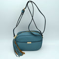 Pebbled Camera Crossbody Bag with Large Statement Tassel Accent