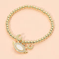 Women's Stainless Steel Mother of Pearl CZ Stone Paved Crab Charm Beaded Stretch Bracelet