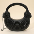 Hard Shell Metallic Sculpted Loop Top Handle Handbag