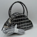 Embossed Dome Handbag with Top Handles and Adjustable Strap