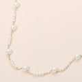 Elegant Graduated Pearl Station Necklace